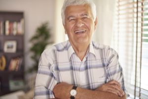 Portrait of vital old man in the living room